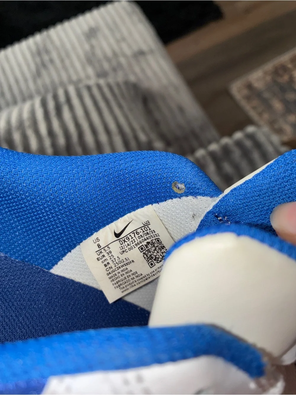 Nike White Sneakers with Blue Swoosh
